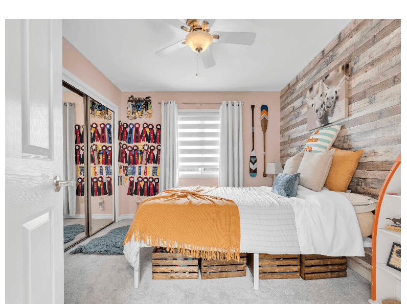Second bedroom with wood feature wall
